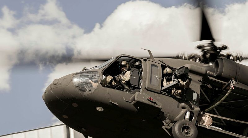 An Australian Army UH-60M Black Hawk helicopter flies through Blacktown, NSW, during a training exercise. Story by Captain Chloe Ellwood. Photo by Private C.