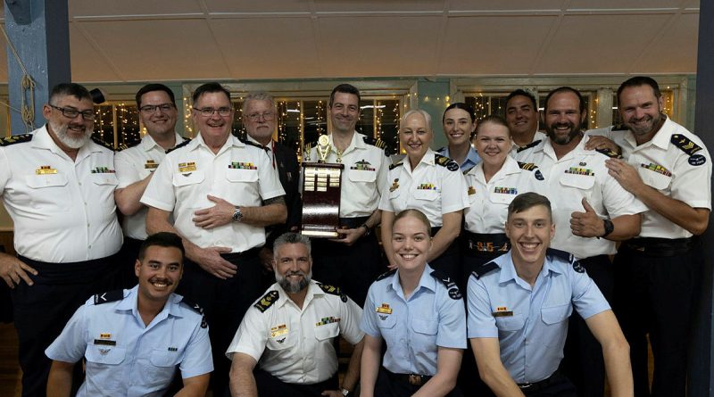 Pathfinder Association representative Jeff McClenaughan awards 35 Squadron the Squadron of the Year trophy during the 2025 Pathfinders Awards at RAAF Base Richmond. Story by Flight Lieutenant Madeleine Magee. Photos by Leading Aircraftwoman Maddison Scott.