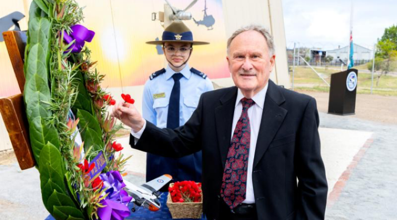 A relative of Flight Lieutenant Ross Frayne – a World War 2 and Korean War veteran who died in a crash at RAAF Base Mallala in 1955 – places a poppy on a commemorative wreath at the new Air Force memorial at the South Australian Aviation Museum. Story by Group Captain Greg Weller.