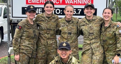 Flight Lieutenants Alyssa Vickridge and Sophie Lanson, Wing Commander Lauren Guest, Flight Lieutenants Harriette Parker and Sharlene Huiskes, with Flying Officer Bun Tang, after the cyclone. Story by Flight Lieutenant Kayla Walliss.