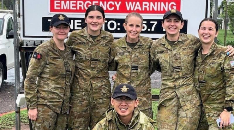 Flight Lieutenants Alyssa Vickridge and Sophie Lanson, Wing Commander Lauren Guest, Flight Lieutenants Harriette Parker and Sharlene Huiskes, with Flying Officer Bun Tang, after the cyclone. Story by Flight Lieutenant Kayla Walliss.