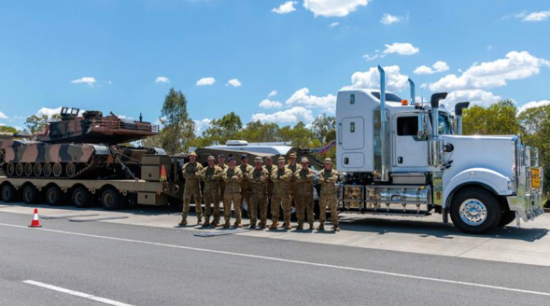 Australian Army and Royal Australian Air Force personnel with the new Kenworth prime mover truck at RAAF Base Amberley, Queensland. Story by Corporal Luke Bellman. Photo by Leading Aircraftwoman Nell Bradbury.