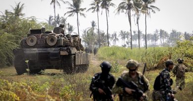 Australian Army and Indonesian National Armed Forces soldiers, supported by an M1A1 Abrams tank, conduct a combined joint-force entry operation as part of Exercise Keris Woomera at Banongan Beach, Indonesia. Photo by Leading Seaman Rikki-Lea Phillips.