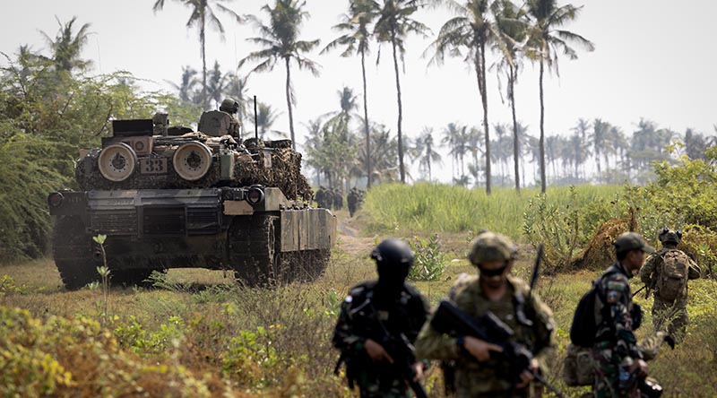 Australian Army and Indonesian National Armed Forces soldiers, supported by an M1A1 Abrams tank, conduct a combined joint-force entry operation as part of Exercise Keris Woomera at Banongan Beach, Indonesia. Photo by Leading Seaman Rikki-Lea Phillips.