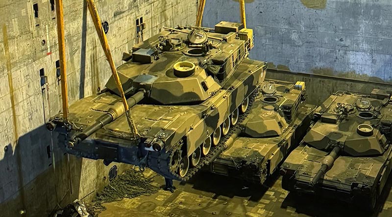 Australian M1A1 Abrams tanks bound for Ukraine are unloaded in Europe after arriving from Australia on a cargo ship. Photo by Lance Corporal JA Thompson.