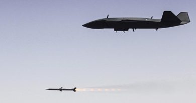 An Australian designed and built MQ-28A Ghost Bat fires an AIM-120 Advanced Medium Range Air-to-Air Missile during Trial Kareela at RAAF Base Woomera, South Australia. RAAF image.