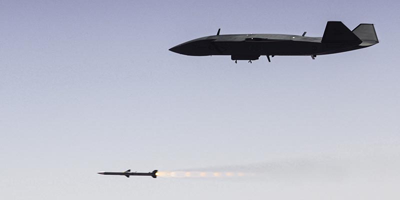 An Australian designed and built MQ-28A Ghost Bat fires an AIM-120 Advanced Medium Range Air-to-Air Missile during Trial Kareela at RAAF Base Woomera, South Australia. RAAF image.