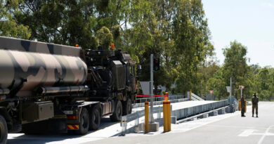 An Army HX81 truck pulls a water tanker to demonstrate the new weighbridge at RAAF Base Amberley. Story by Warrant Officer Class 2 Max Bree. Photos: byPrivate Mikayla Abson.