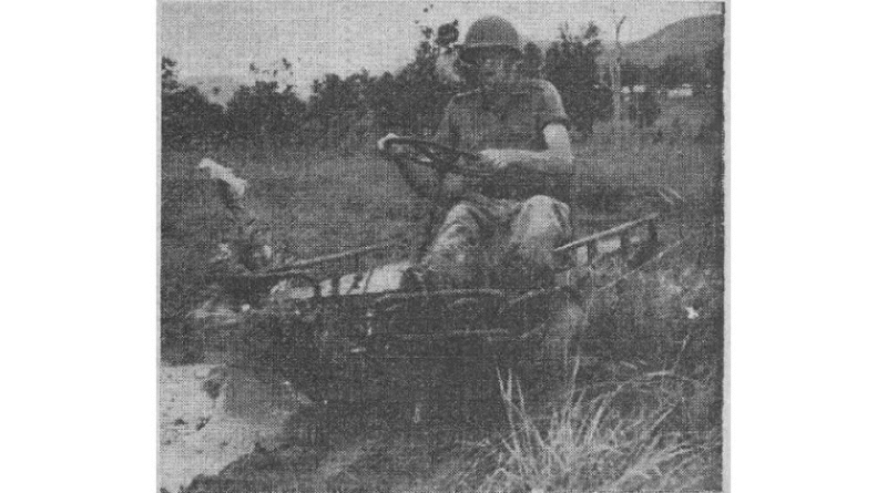 A soldier rides a Mechanical Mule in a 1960 photo from the Australian Army newspaper, now digitised through Trove.