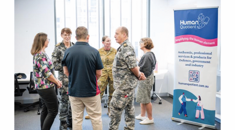 Captain Bernadette Alexander and Command Warrant Officer Dennis Bentley speak with community stakeholders and Human Quotient Group, Defence at a celebration marking the completion of the Darwin Cowork Coplay program.