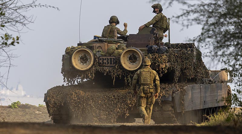 An Australian Army M1A1 Abrams from 2nd Cavalry Regiment conducts an amphibious assault during Exercise Keris Woomera 2024 at Banongan Beach, Indonesia. Photo by Corporal Janet Pan.