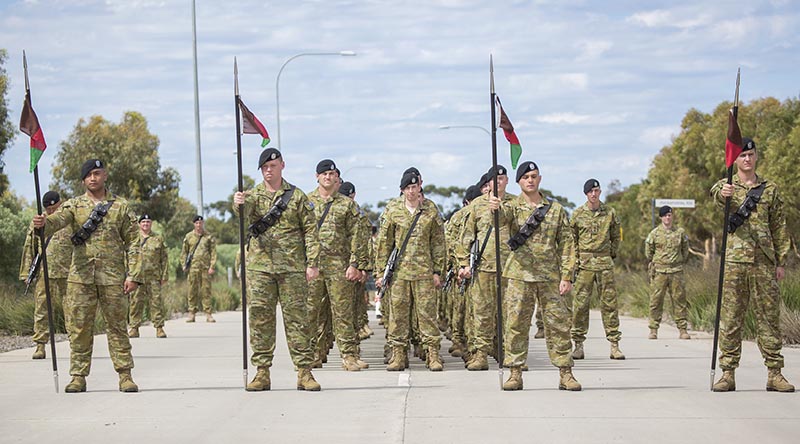Soldiers from the 1st Armoured Regiment await the order to start the parade to mark the 100th anniversary of the Battle of Cambrai. Photo by Corporal Craig Barrett.
