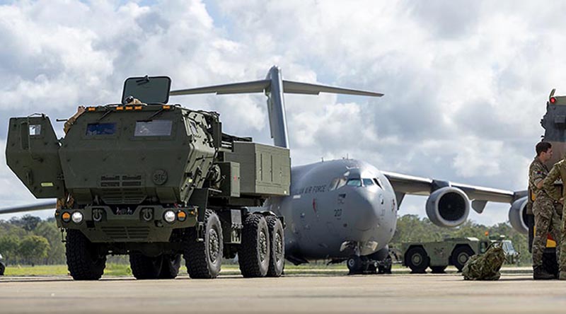 An Australian Army M142 HIMARS is prepared for loading onto a United States Air Force C-17 Globemaster III at RAAF Base Amberley. Photo by Corporal Jesse Linards.